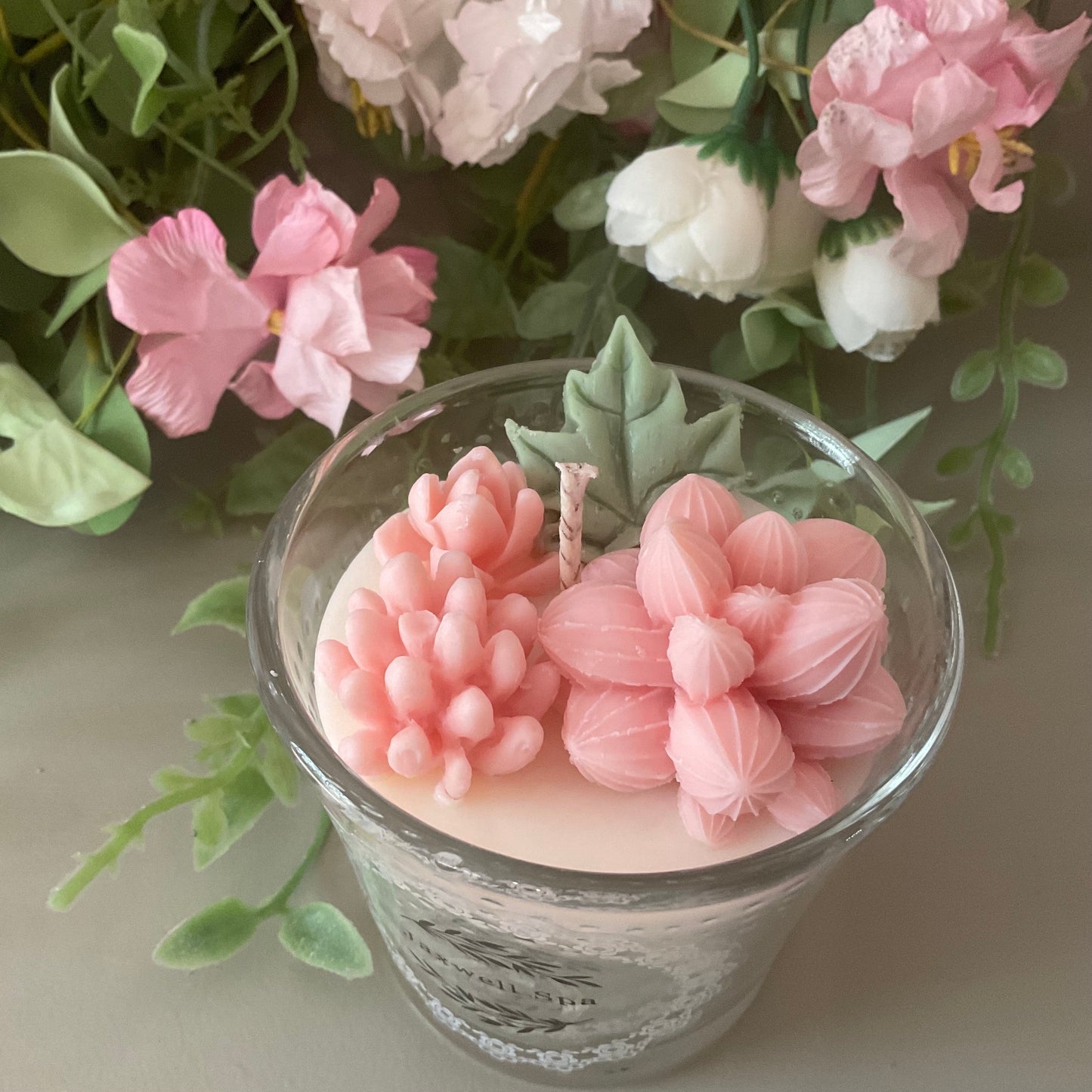 Pink succulents candle