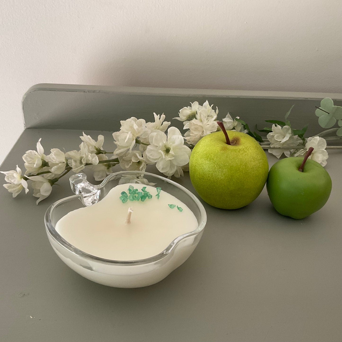 Clear glass candle in apple pie fragrance