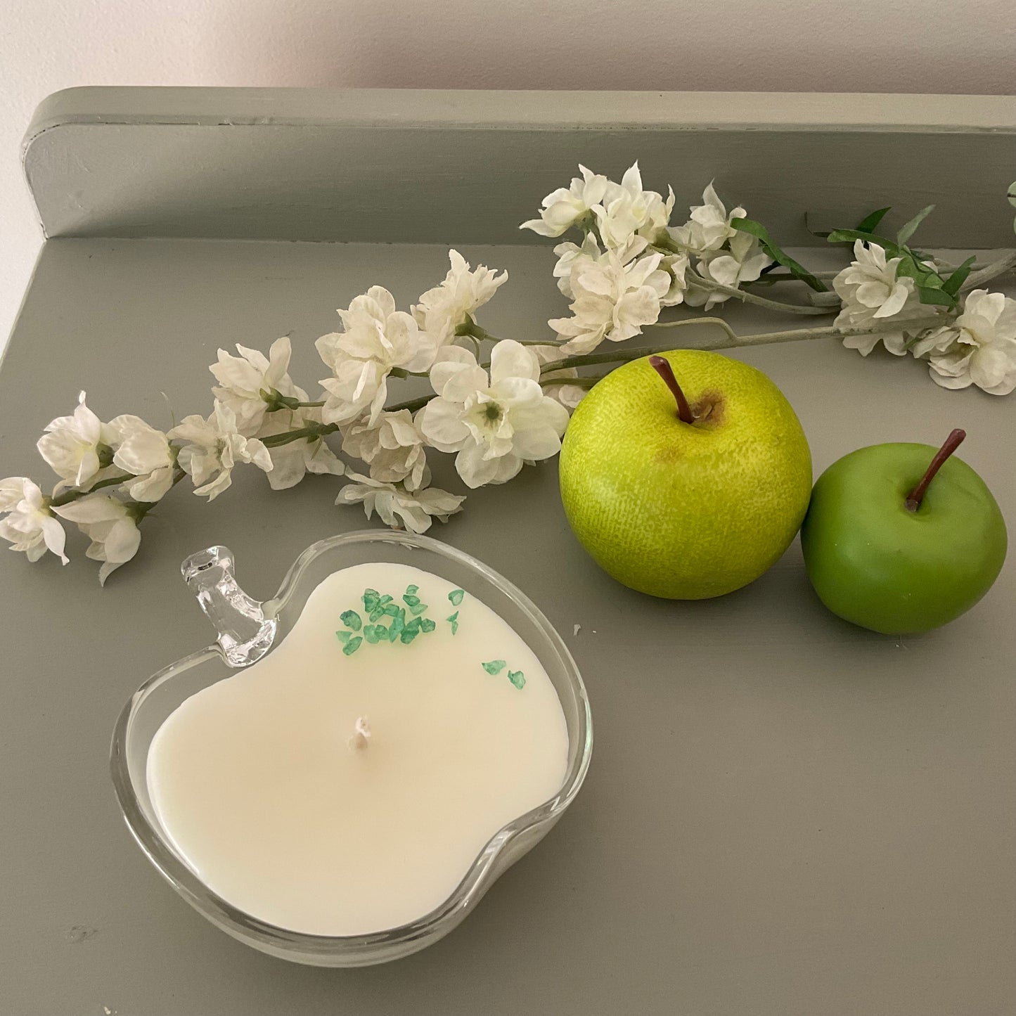 Clear glass candle in apple pie fragrance