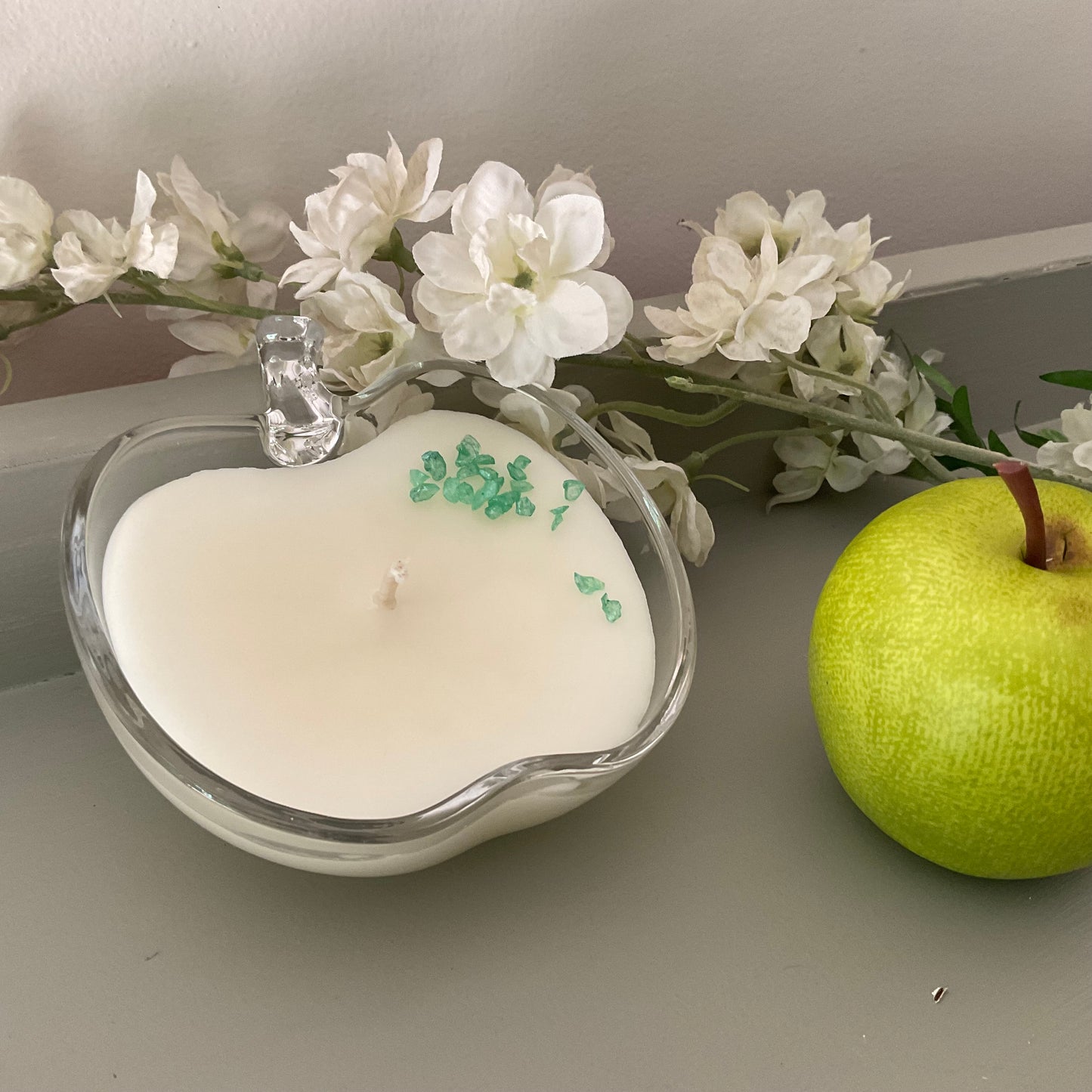 Clear glass candle in apple pie fragrance